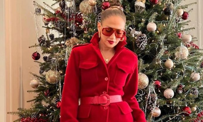Jennifer Lopez's stunning festive look and bedazzled purse
